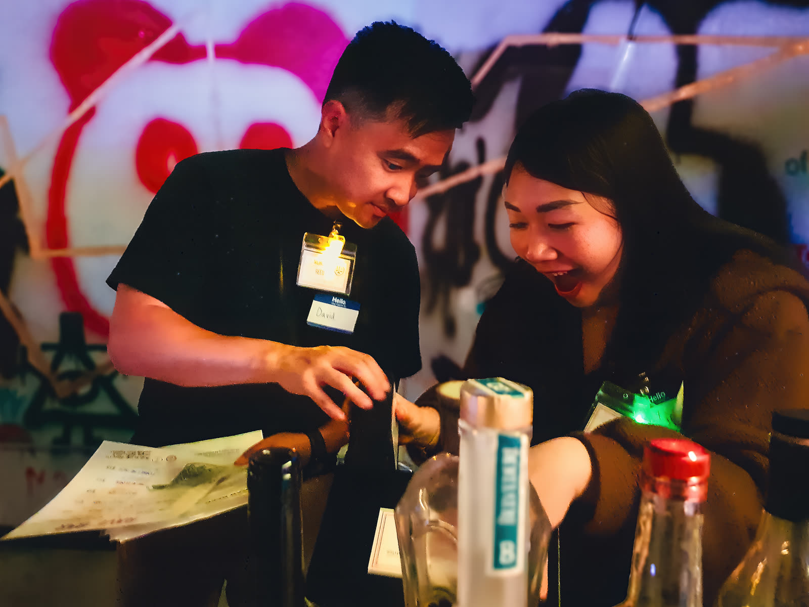 A player laughing at the bar during the game